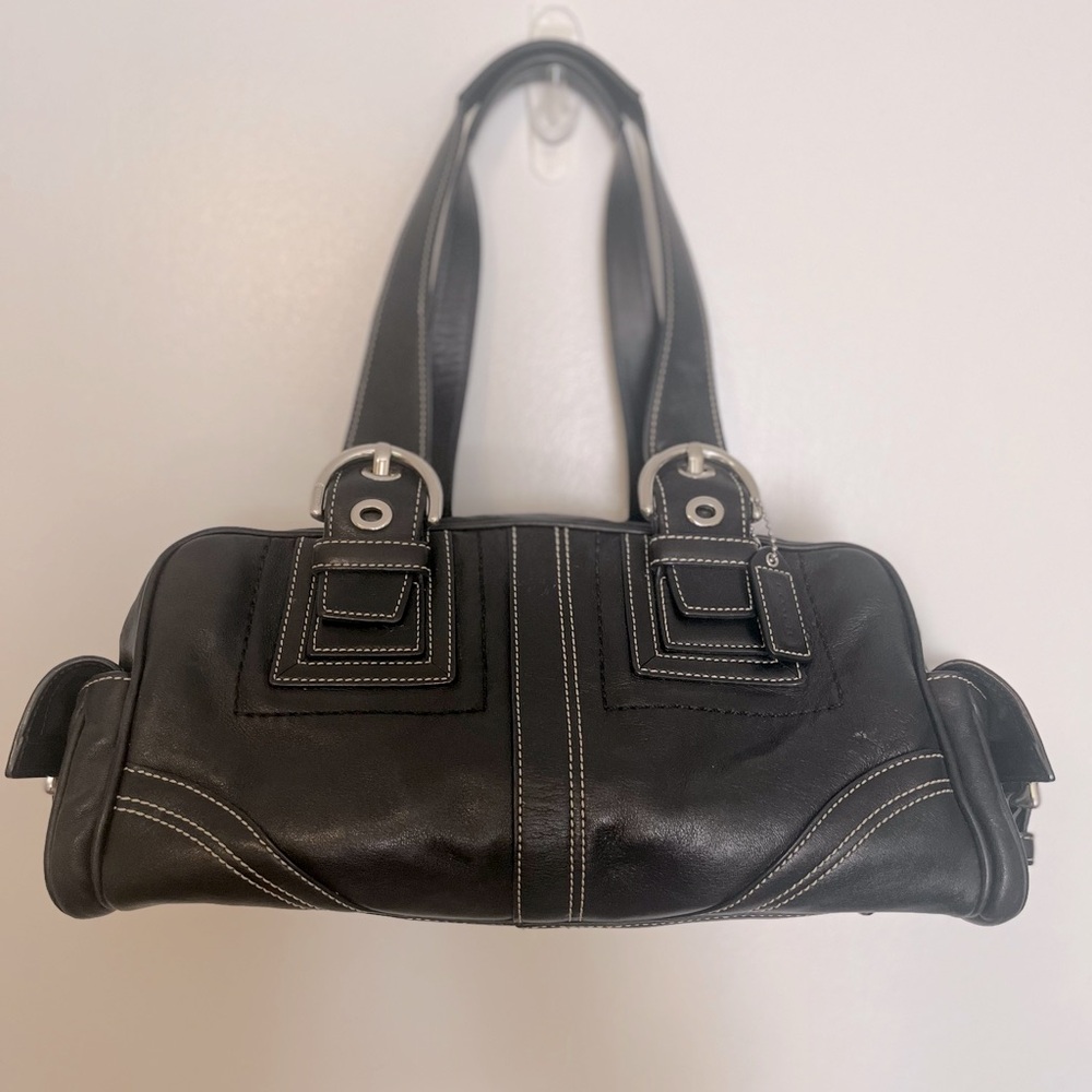 Coach women’s black bag. Used but good condition.